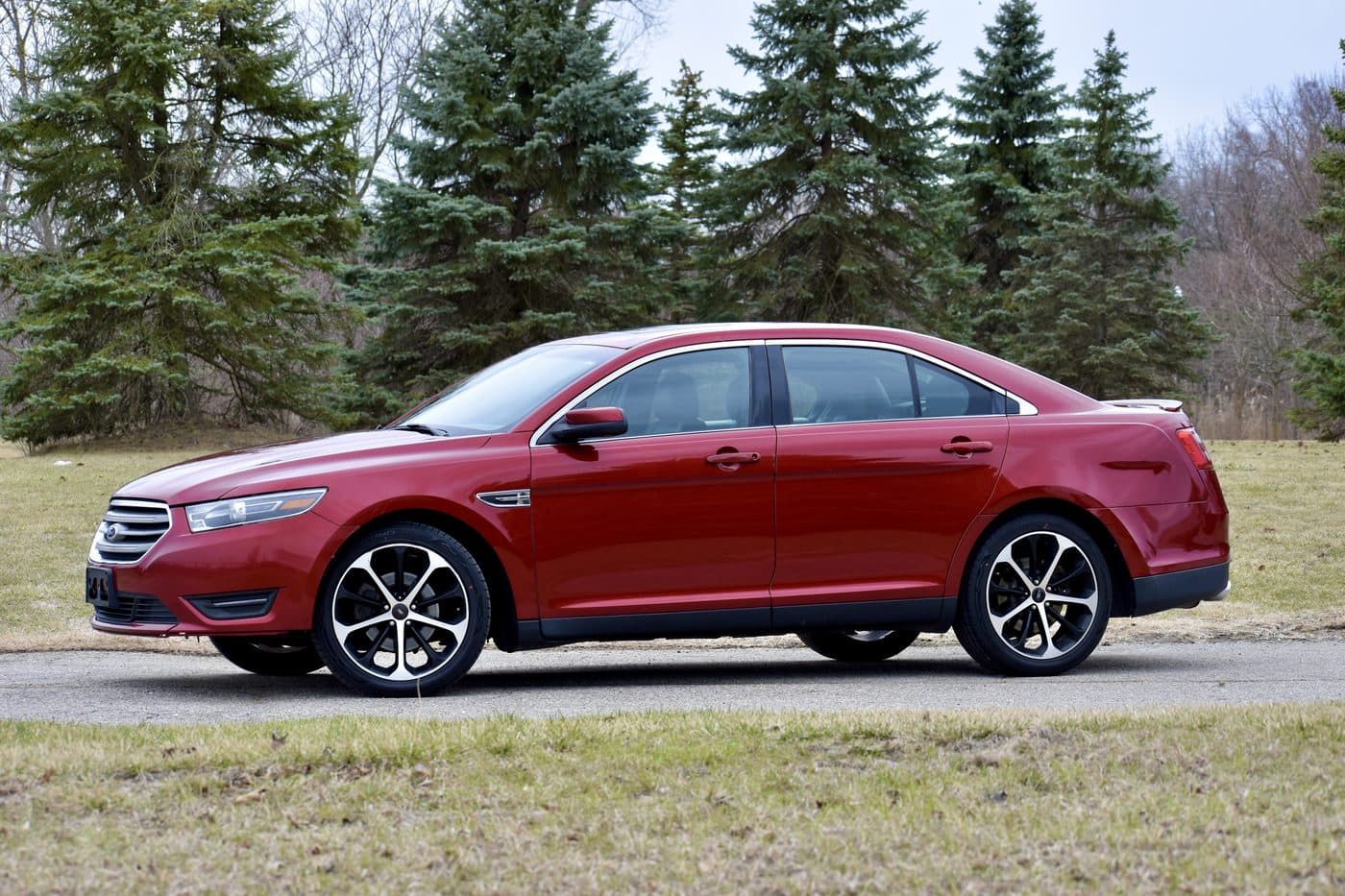 Red Ford Taurus from the FAJ Rentals fleet
